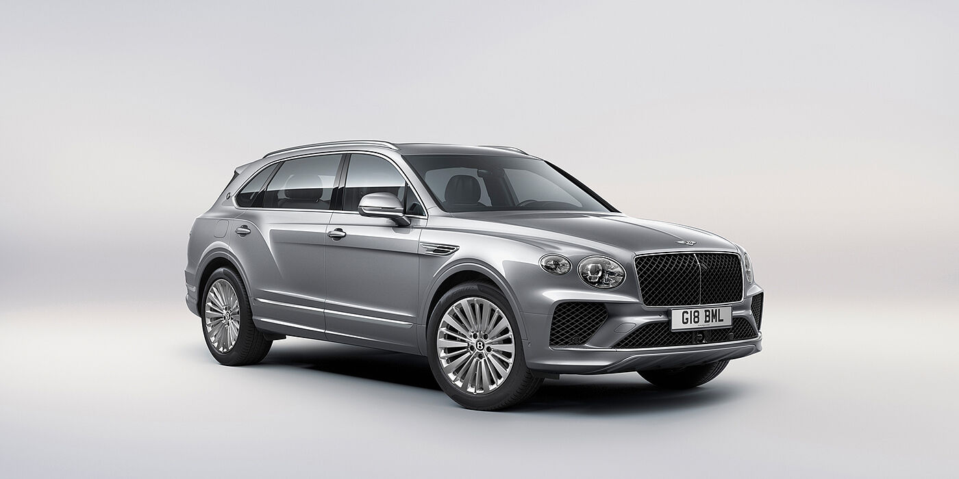 Bentley Lyon Bentley Bentayga Extended Wheelbase luxury SUV front three quarter view in Moonbeam paint with 21 inch five spoke painted wheels