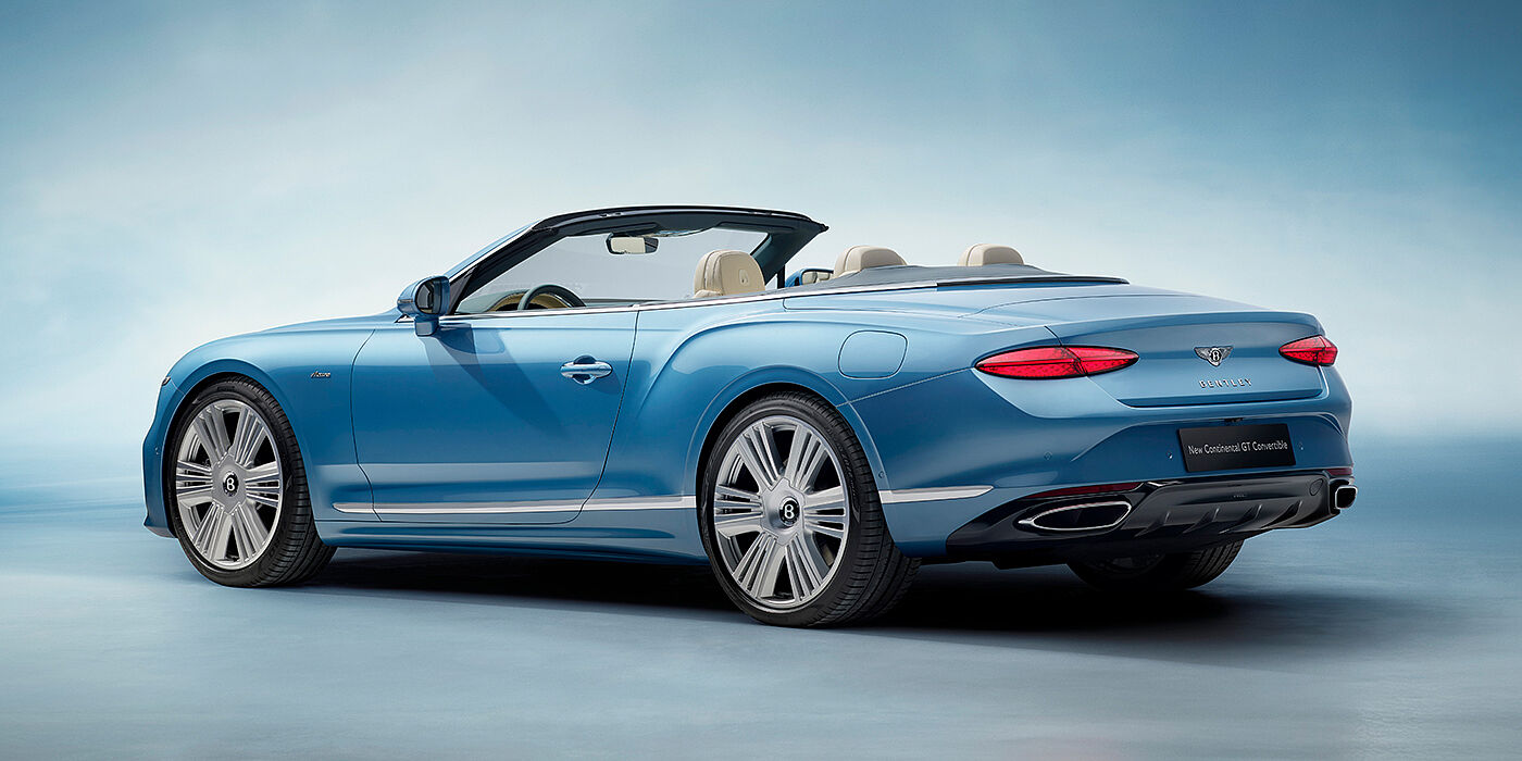 Bentley Lyon New Bentley Continental GTC Azure convertible rear view in Light Windsor blue paint with 22 inch ten spoke wheels and chrome exterior details